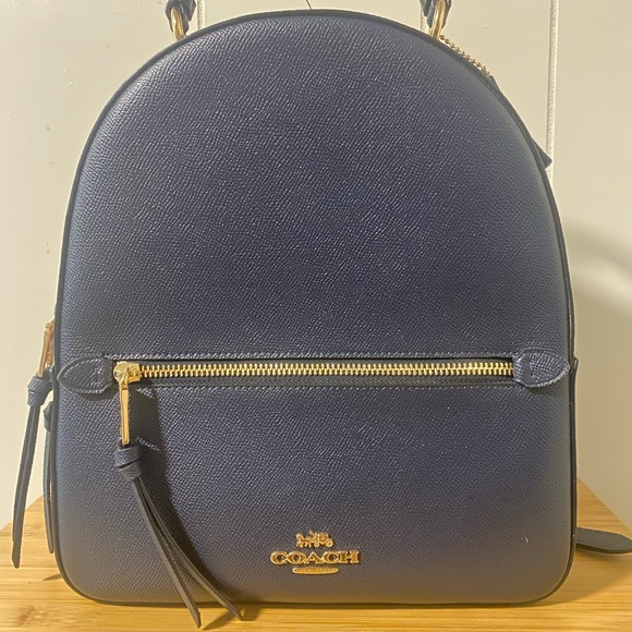 Coach Handbags - COACH navy blue mini back pack (like new)